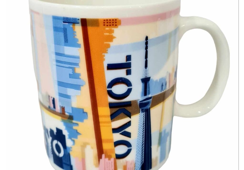 Tokyo skyline mug, colorful design.